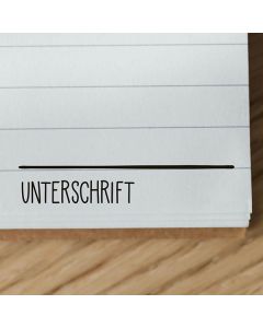 Holzstempel mit Abdruck Unterschrift  